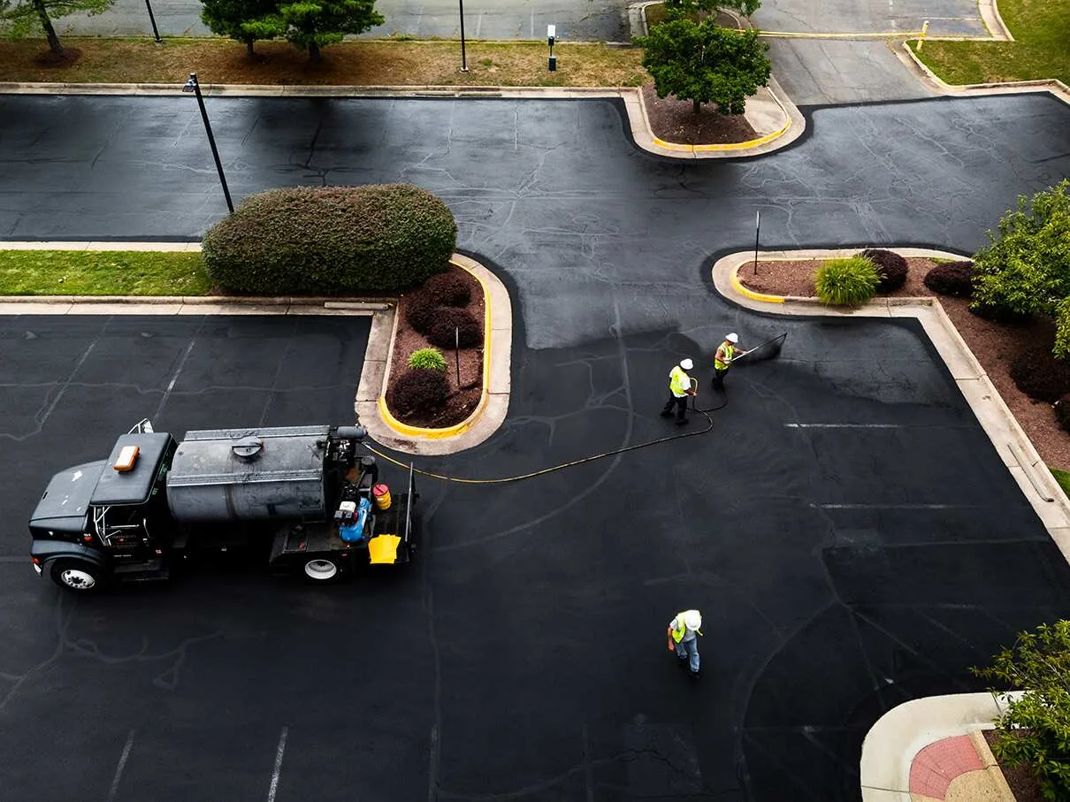 Read more about the article Why Commercial Parking Lots Need Regular Sealcoating?