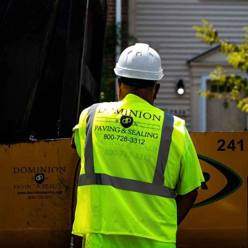 Close-Up Shot of Dominion Paving Contractor's Work Vest